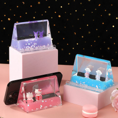 新しいデスクトップ流砂かわいい携帯電話スタンドアニメ人形が油液体に入ってアイデアプレゼント砂時計卸売り
