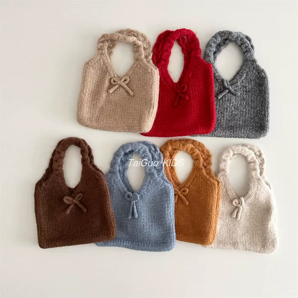 Korean-style new children's solid color bow-knot knitted open-top versatile handbag for girls, stylish and lightweight small bag