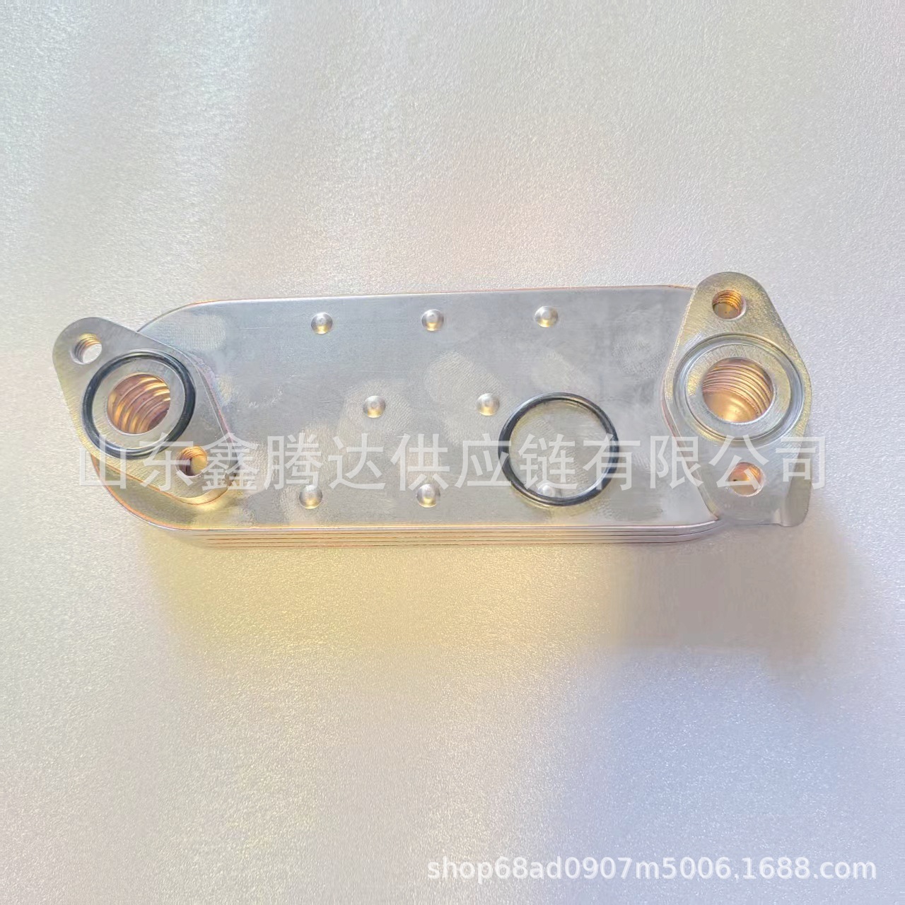 Factory Direct Supply of Engine Oil Cooler for Japanese Cars, Auto Parts Ok55114701 with 5-Layer Water Deflector
