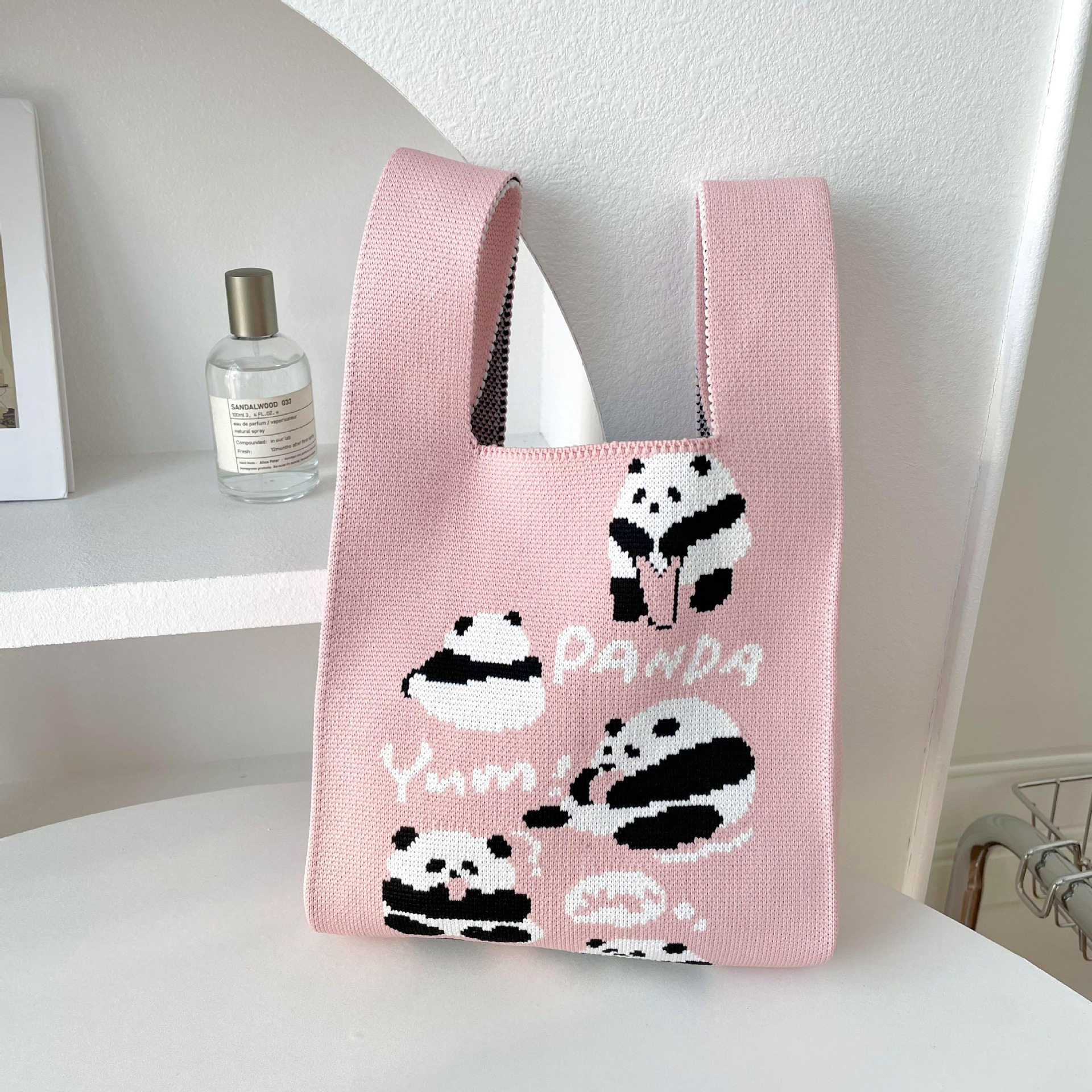 Bolsas de nicho de diseño de pandas lindos bolsas de mano de punto bolsas de mano estudiantes personalidad bolsas de brazo fábrica al por mayor