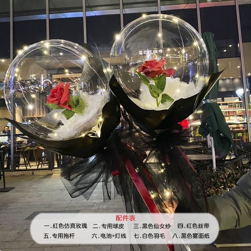 光る夜市の円形の赤い屋台のネットを並べてボールを押して会の風船のイルミネーションの明かりの告白のロマンチックな波の地帯のスーツを押します。|undefined