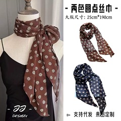 フランスのレトロなカレー色の長い波点のシルクタオルの女性の軽い贅沢な高級感の百合は首の薄いマフラーのリボンを結びます。