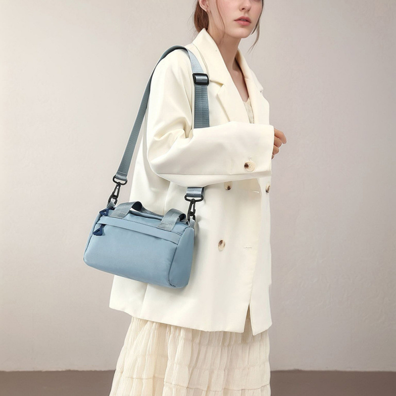 Bolso de mujer japonés simple bolso de hombro de mujer casual de gran capacidad bolso de mano deportivo versátil bolso de viento deportivo