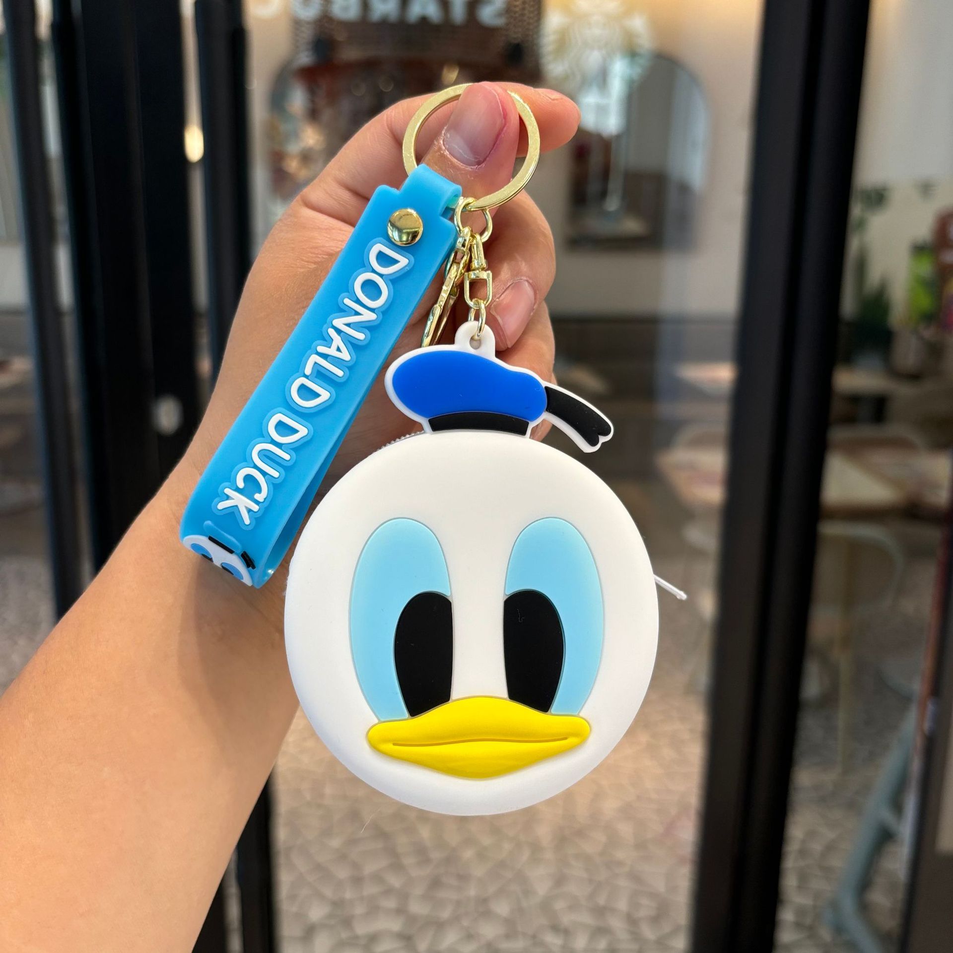 Transfronterizo Kapibara llaveros Kulomi bolsos de cambio llaves colgantes bolsos accesorios pequeños regalos al por mayor