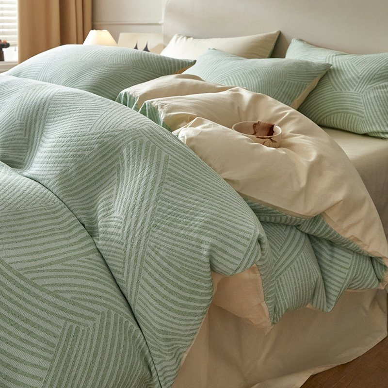 Una clase de madres y bebés Jacquard algodón puro cuatro piezas no impresa viento algodón desnudo cama