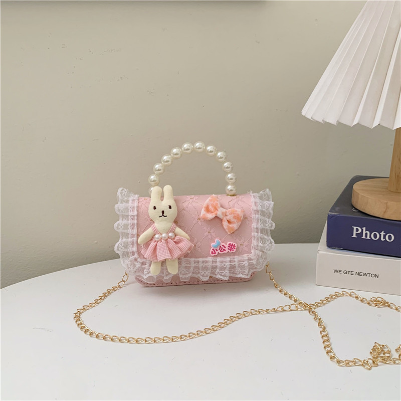 2025 nuevo pequeño viento de fragancia bolsos infantiles mil pájaros pequeños conejos de flores princesa mochila perlas bolsos de moda