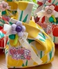 Tulip yellow plus ribbon small flower purple