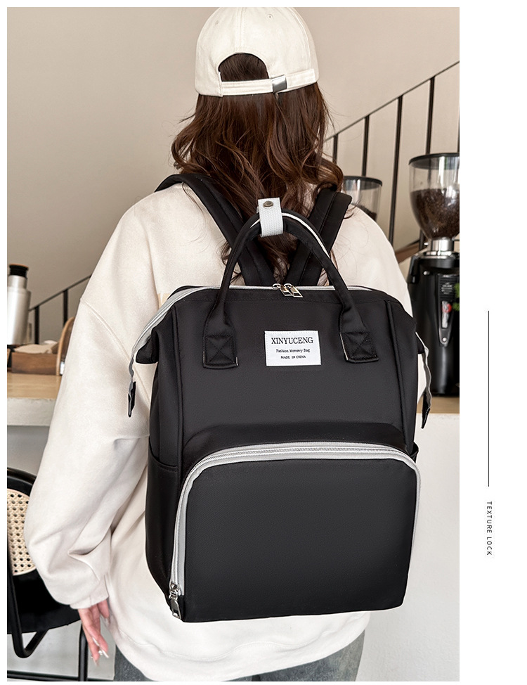 Solid-color lightweight mom bag, a backpack for taking kids out, multi-functional large-capacity mother and baby bag for girls undefined