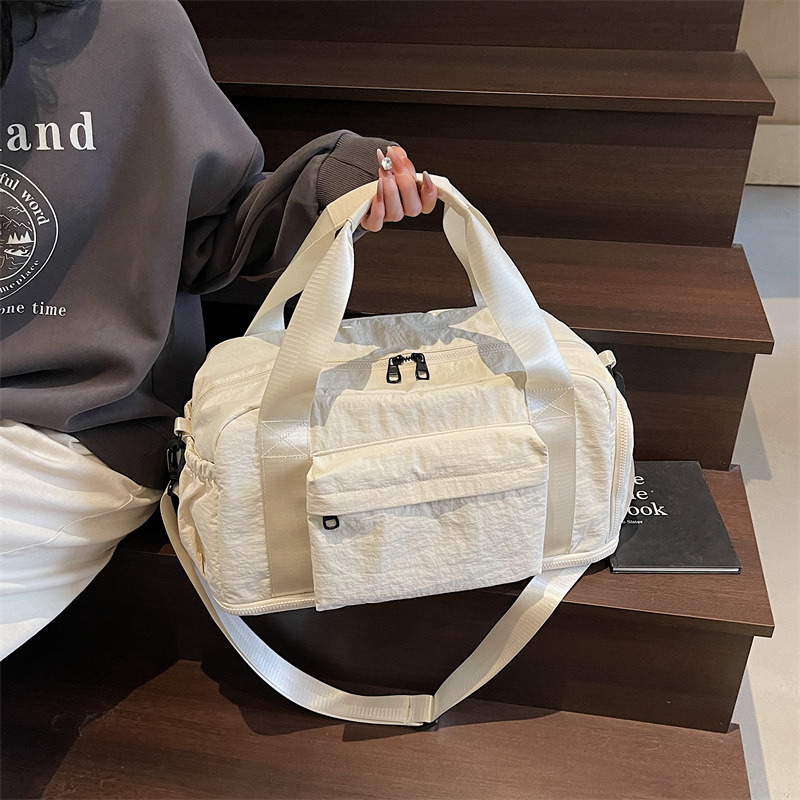 Bolsa de ejercicios de gran capacidad, bolsa de yoga deportiva simple, nuevo paquete de viaje de negocios portátil de color sólido coreano.