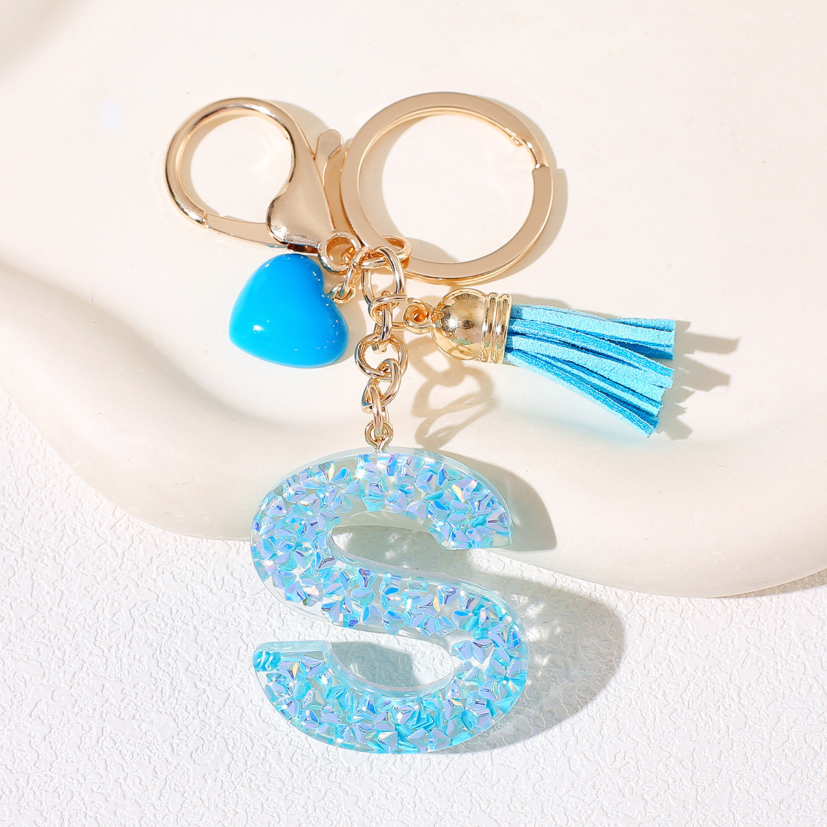 Nuevos productos azules de amor con frascos de letras lindos enclavadores decoraciones europeas y americanas populares llaveros damas