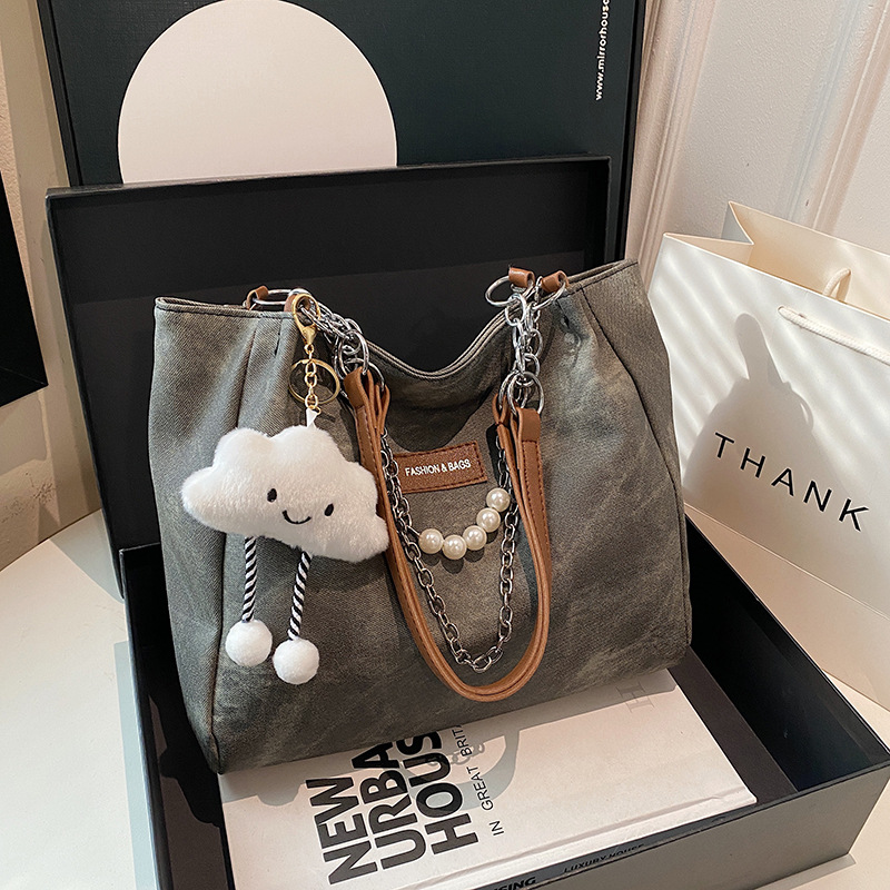 Capacidad de gran cadena de TOT 2024 nueva bolsa de moda de viaje de hombro de invierno para estudiantes universitarios superiores bolsa de clase