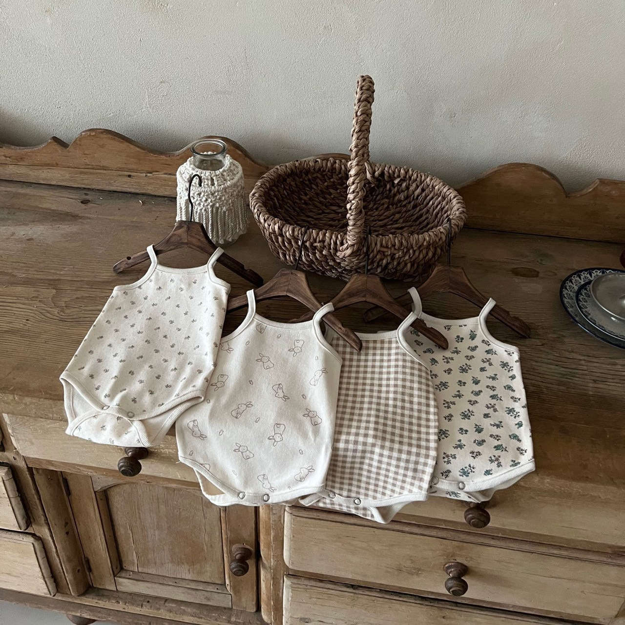 Estilo coreano bebé niños y niñas impreso de algodón acolchado mameluco ins verano recién nacido versátil chaleco casual triángulo mameluco