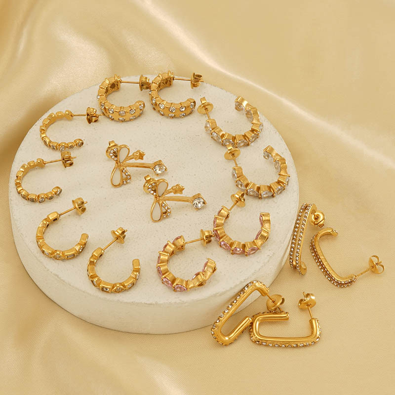 Cruz-frontera nuevo acero inoxidable 18K Luz de lujo pendientes de diamantes hembra nicho europeo y americano personalizado pendientes de diseño al por mayor