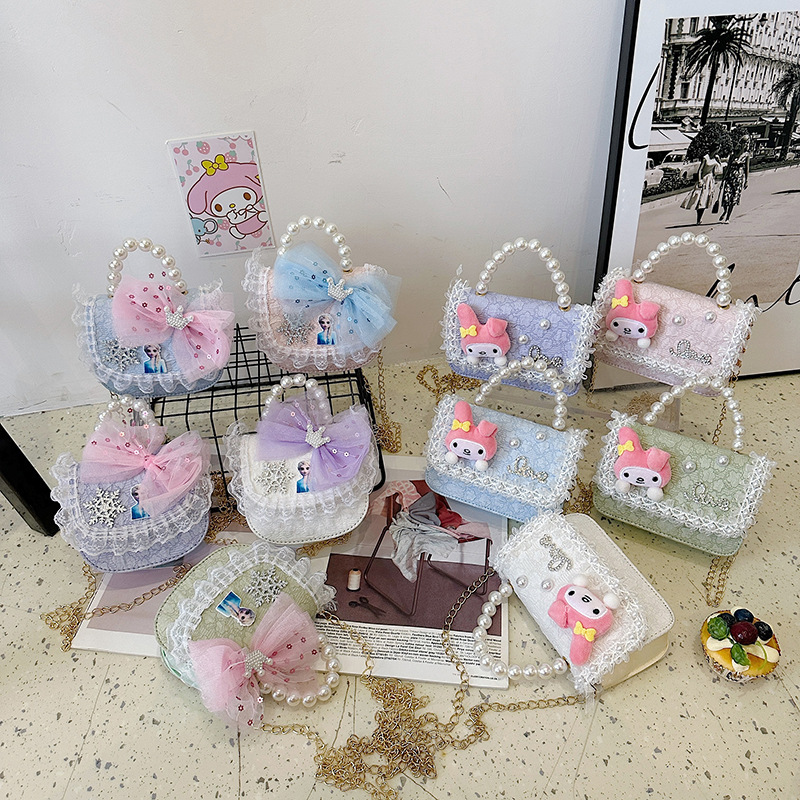 2025 nuevo bolso de perla para niños arco encantador caricatura cadena de estilo exterior bolsa de cambio de moda versátil