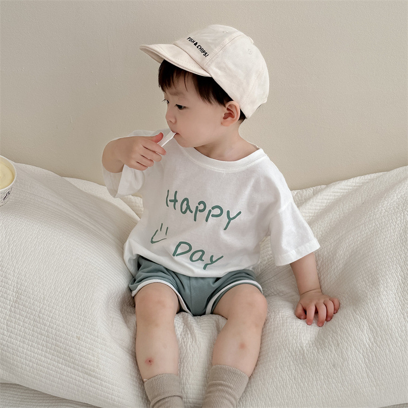 Traje de pantalones cortos de manga corta para niños, ropa de verano para niños, estilo delgado, ropa para niños coreanos, traje de sonrisa de letras de verano para bebés