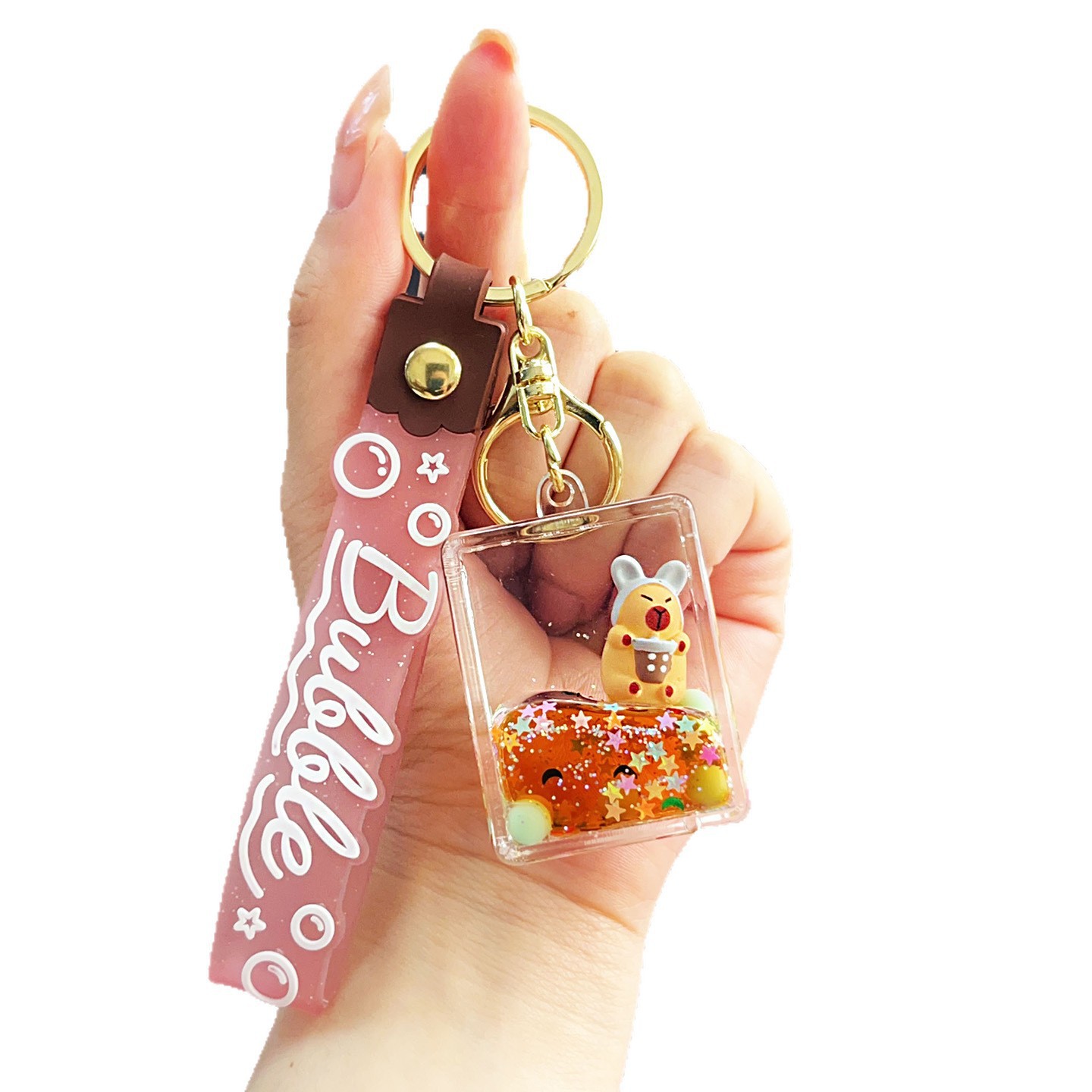 Nuevo aceitoso arena movediza taza de té con leche llavero colgante lindo divertido Kapibala llavero flotante pequeño regalo al por mayor