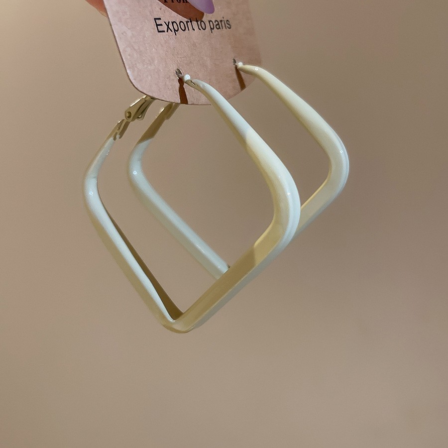 Europa y los Estados Unidos transfronterizos agujas de plata aretes de metal fríos aretes de estilo estilo universal simple aretes de diseño de nicho