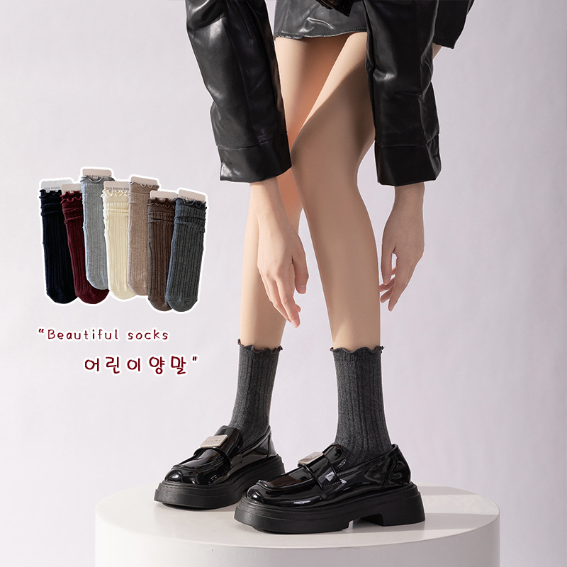 Mulberry calcetines mujeres primavera y otoño de color sólido dulce pilas verticales pilas en la moda japonesa universidad tubo de viento y calcetines de algodón