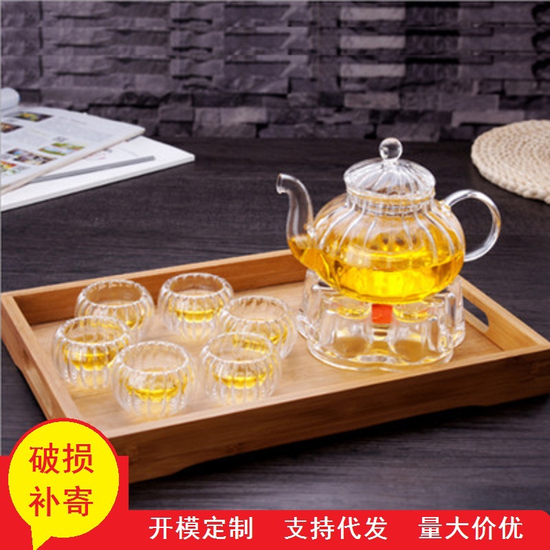 Venta al por mayor de borosilicato resistente al calor juego de té de vidrio engrosado Filtro de flores y hierba tetera a rayas calabaza olla traje de entrega de una sola pieza