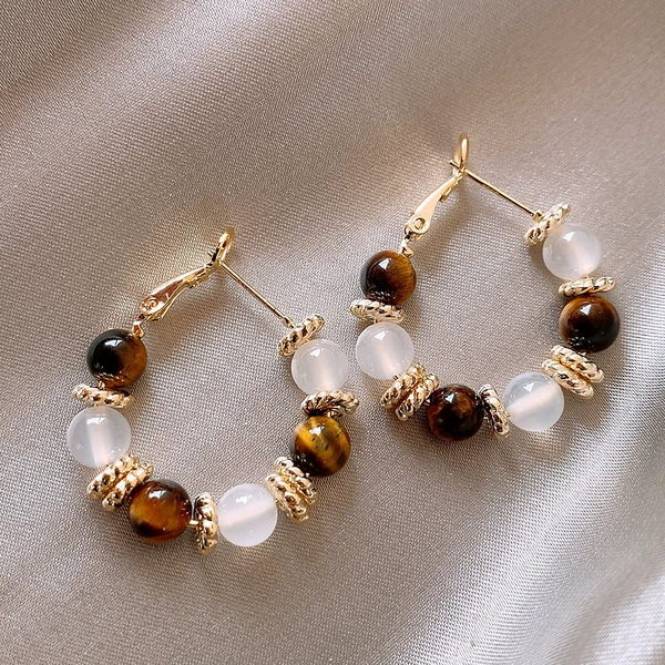 Silver earrings, cat's eye