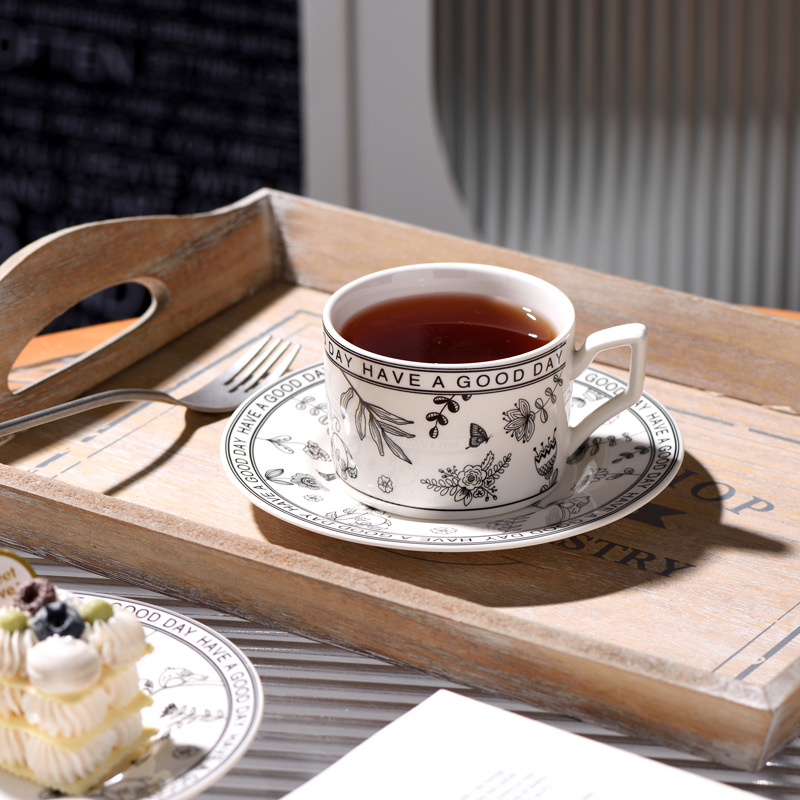 Pinellia Flower Small Fragrant Coffee Taza y platillo Valor nominal Taza de té de la tarde con la mano Taza de agua de sentido retro