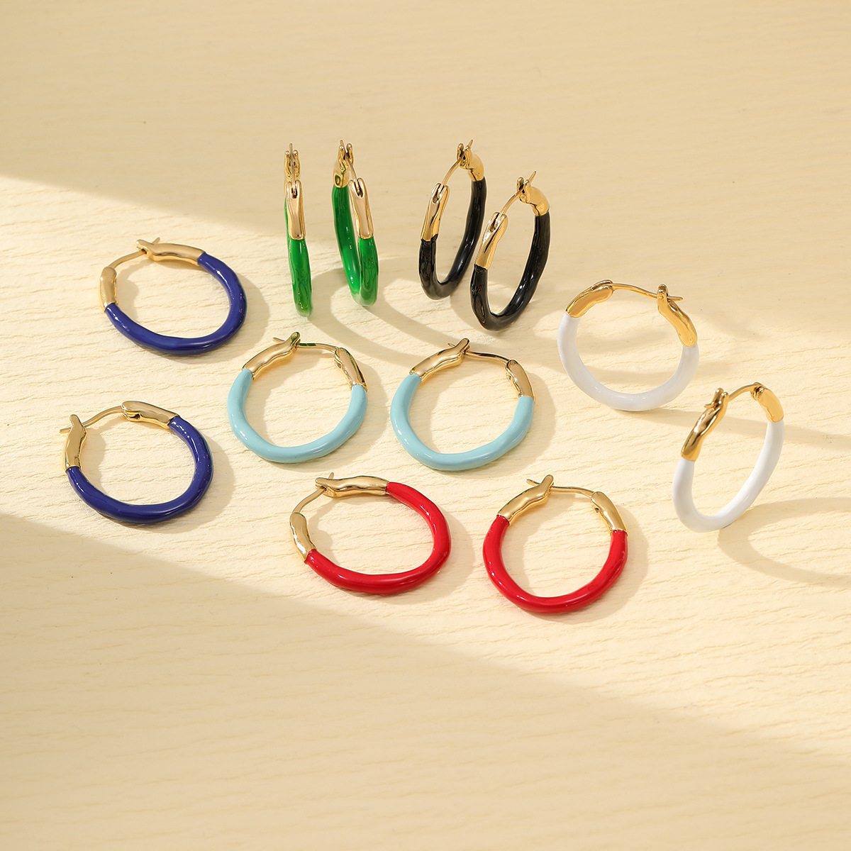 Fashionable small design earrings stainless steel