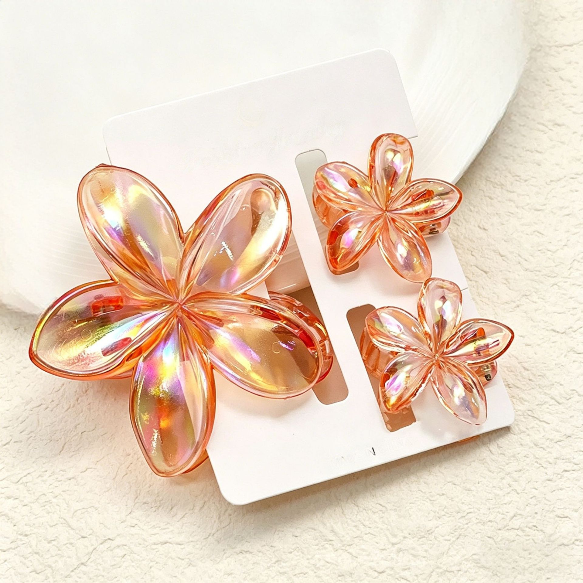 Ventas transfronterizas calientes nuevos huevos láser de dos colores clip de agarramiento de flores de cabeza posterior clip de tiburón clip de cabello joyerías para el cabello