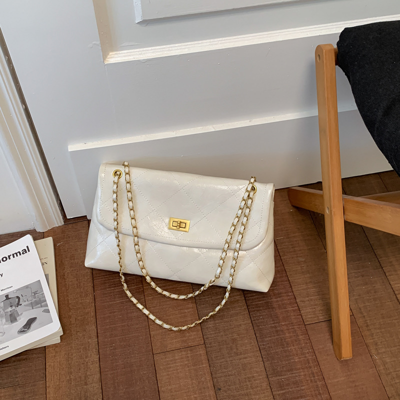 Bolso retro de gran capacidad para mujeres 2026 nueva moda cadena de diamante mochila de hombro de nicho de viaje bolsa de mano