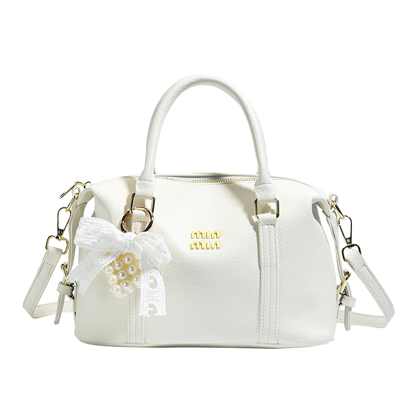 2026 nuevo bolso de bolos de mano de mujer simple sensación cotidiana de nicho de viaje coreano bolso de mujer bolso de almohada