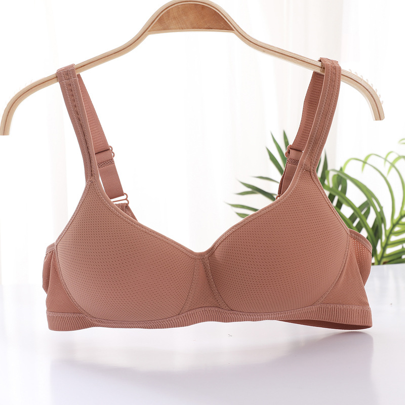 Fábrica de stock sin anillo de acero ligero delgado y transpirable sin ropa interior esponja, gran pecho pequeño sujetador anti-caída