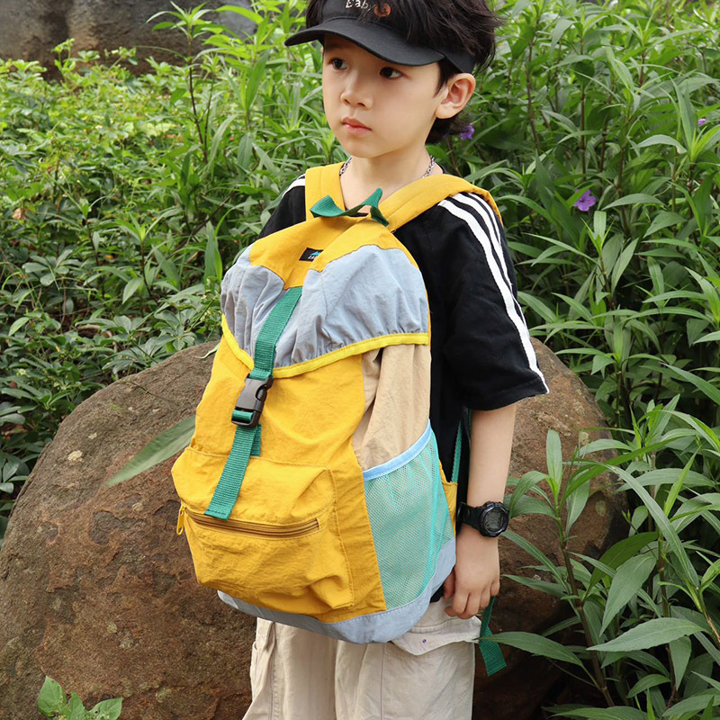 Bolso de viaje simple y casual de gran capacidad 2025 nueva mochila para estudiantes con cordón Mochila para niños de moda coreana