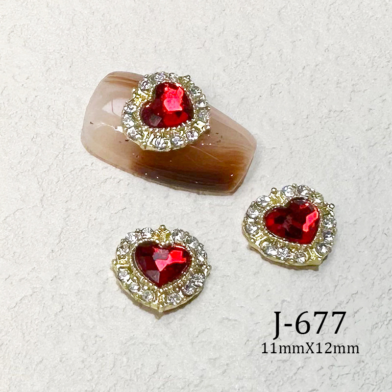 2023 Nueva joyería de uñas Año nuevo rojo aleación conejo rojo mariposa de cristal pintura en aerosol arco accesorios de diamantes de uñas