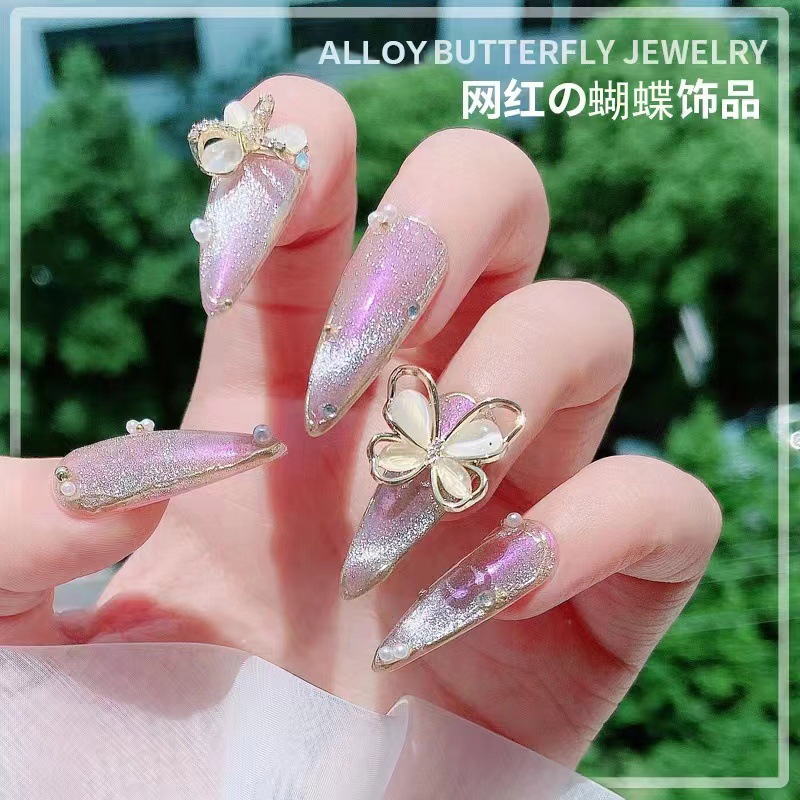 Accesorios de uñas Opal Mariposa nueva flor de lujo ligero Aleación de diamantes accesorios pegatinas de uñas decoración de diamantes de imitación al por mayor