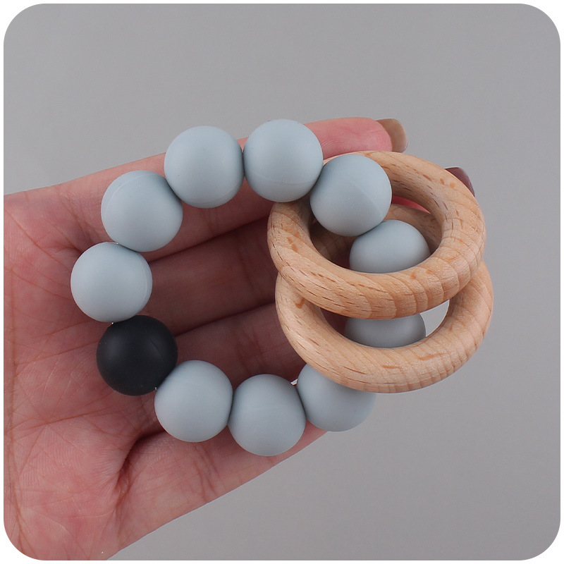 Nuevo bebé haya anillo mordedor pulsera creativa bebé silicona contraste color mordedura molar juguete