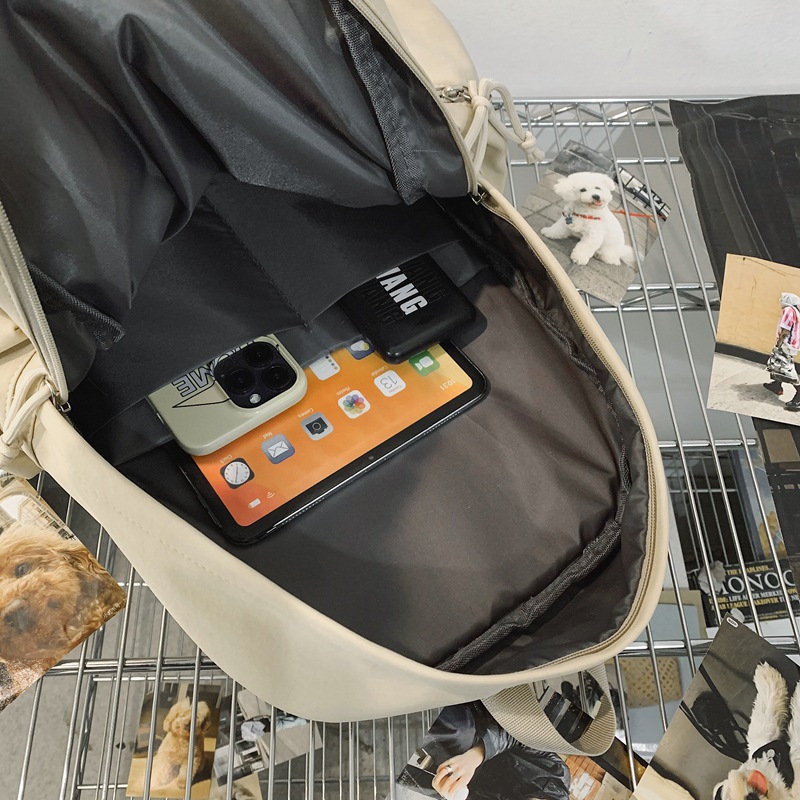 2024 invierno nueva mochila ligera de nailon de gran capacidad casual simple y versátil mochila para computadora para estudiantes de secundaria