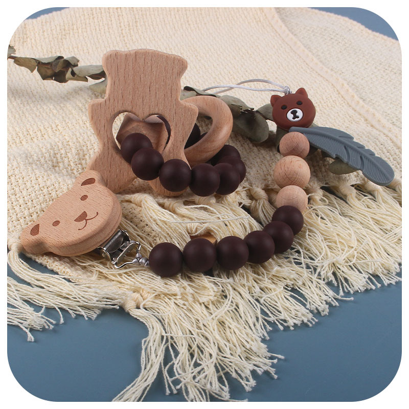 Nuevo bebé suministros calmante haya juguetes animales Cadena de chupete de silicona corona de cinco puntas estrella mordedor traje