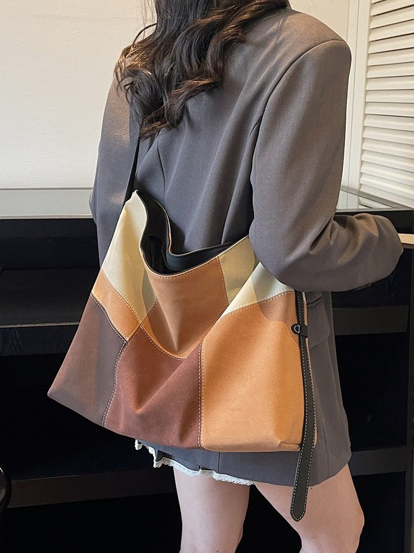 Bolsa de mujer de gran capacidad de hombro bajo la axila venta caliente nueva textura de alta calidad nicho coreano empalme bolso especial
