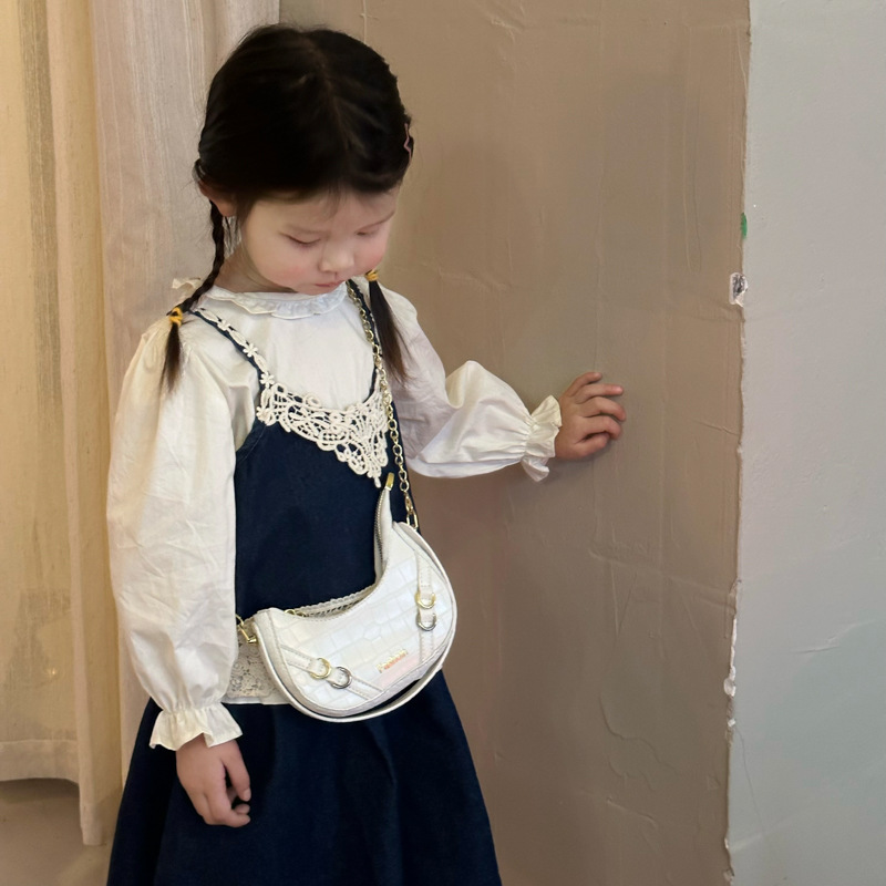 Bolso para niños coreano piedra simple bolso de hombro para bebés de color sólido 2025 nuevo bolso para niñas debajo de la axila