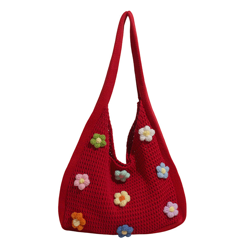 Versión coreana del bolso de nicho 2025 verano nuevo bolso femenino Xuan Yafeng flor bolso de hombro hueco de punto