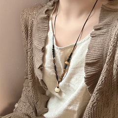 新しい中国風の松子の木の玉のペンダントのネックレスの民族風の復古の長いタイプの毛の服のチェーンの小さい大衆の独特なアクセサリーの卸売りの女性