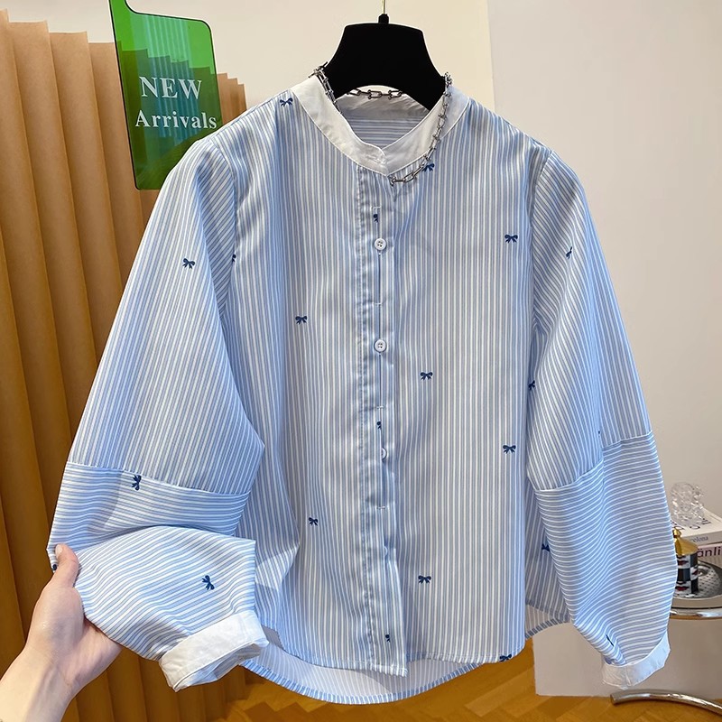 Spring blue shirt with a round collar