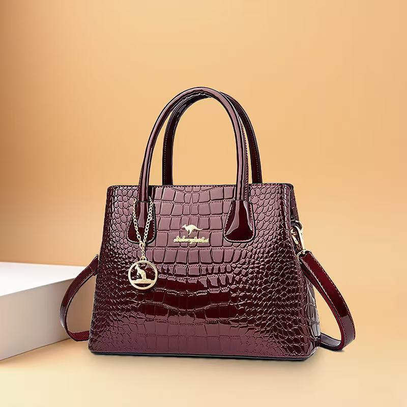 Bolso de mujer en caliente, nuevo tipo de bolso canguro, bolso de cinturón, bolso de mano de piel esmaltada brillante, bolso de hombro de mujer, agencia de cabello