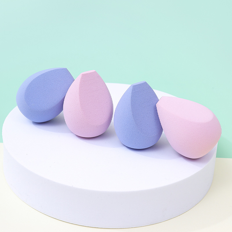 Fábrica personalizada de huevo de maquillaje de tres cuchillos polvo de maquillaje no comer polvo de maquillaje de doble uso esponja de maquillaje huevo de maquillaje al por mayor transfronterizo