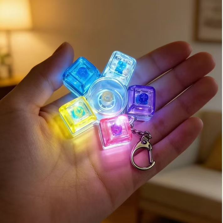 Fidget spinner with glowing buttons, a stress-relieving toy, a creative keychain for children, a colorful light-up toy wholesale.