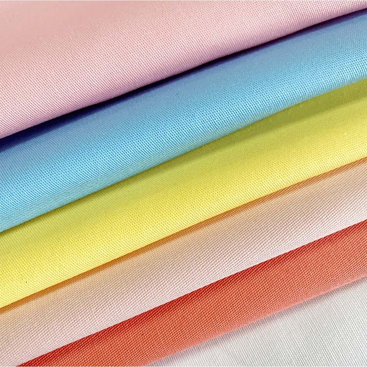 Fabricante de suministro de algodón trenzado Twill suave tela de jeans