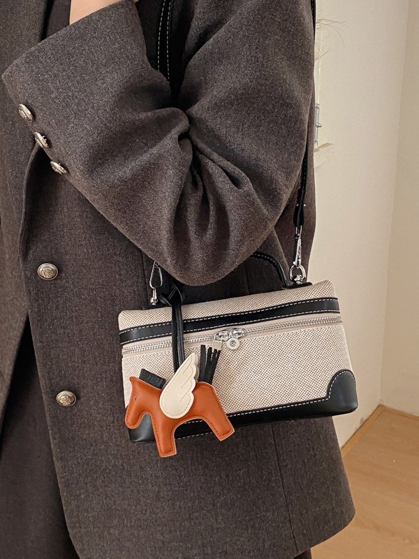 Bolso de mano de alta sensación 2026 nuevo lienzo de moda bolso de color pequeño bolso cuadrado de viaje bolsa de mochila ocio