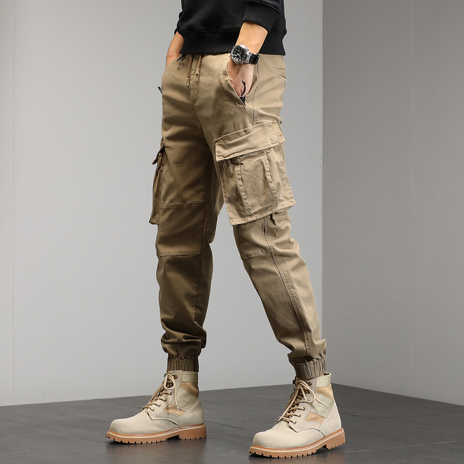Joven hombre otoño nuevos pantalones de trabajo, pantalones casuales, pantalones de bolsillo simples, ropa de hombre elástica