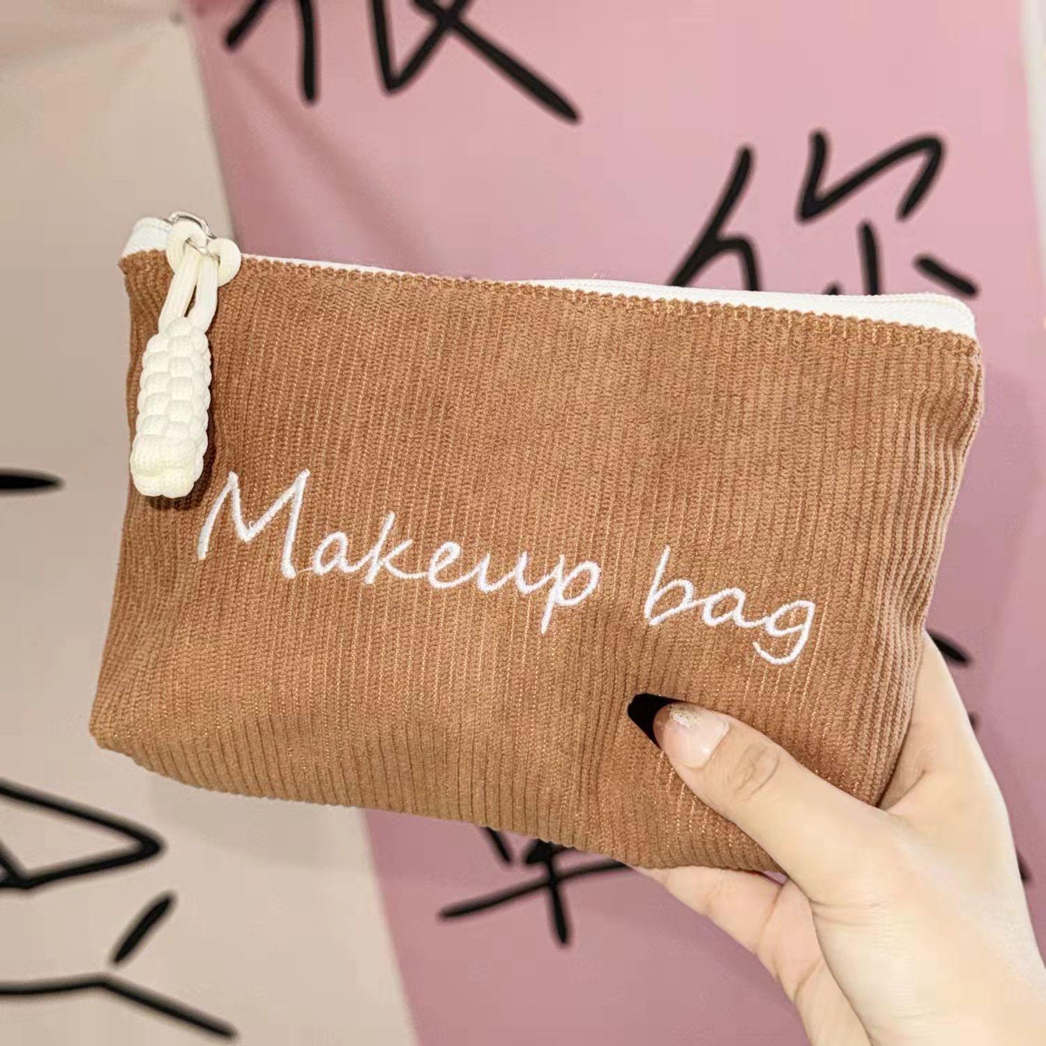 Bolsa de maquillaje de bordado de tenue agujas nicho color de viaje portátil bolsa de almacenamiento de productos de cuidado de la piel bolsa de lavado