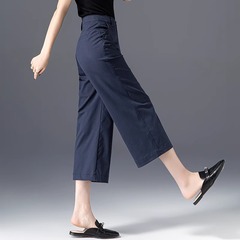 紺色のワイドパンツの女性の春夏の新型のヨーロッパの商品のハロンの大根のカジュアルなズボンの小さい背の高い腰のまっすぐな筒の八分のズボン