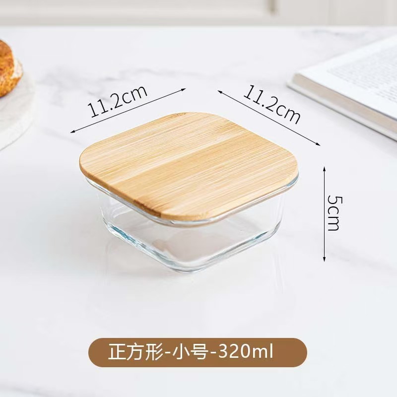 Fiambrera de vidrio redonda, horno de microondas, horno de calefacción especial, caja de mantequilla de frutas frescas con separación de arroz
Cubierta de bambú y madera